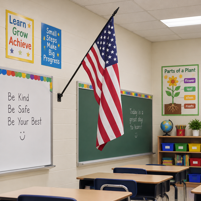 An American flag mounted on a  black wooden staff with a gold spear top in a classroom