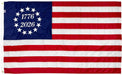 Flag with 1776-2026 text on a blue and red background